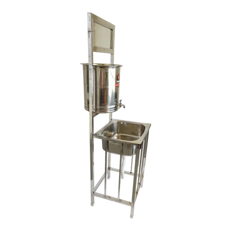 Stainless steel portable handwash station placed beside pooja room for hygienic rituals.
